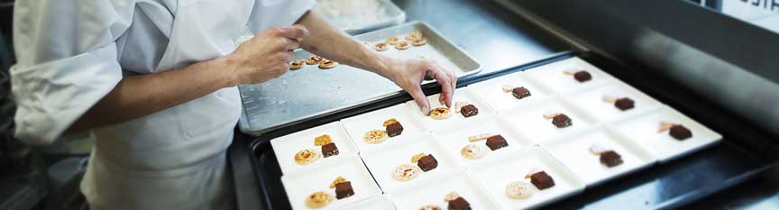 Picture of woman handling food pastries