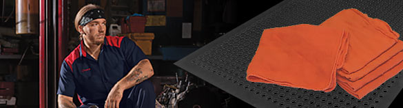 Image of Automotive tech and AmeriPride mats and towels 