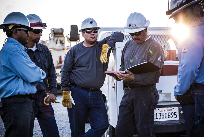 image of iq Shirts being worn by worker